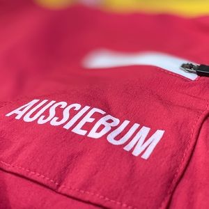 Aussiebum swim trunks. Red with yellow trim. Small.